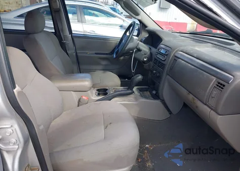 2003 Jeep Grand Cherokee Laredo z USA, uszkodzony, nr VIN 1J4GW48S13C613445